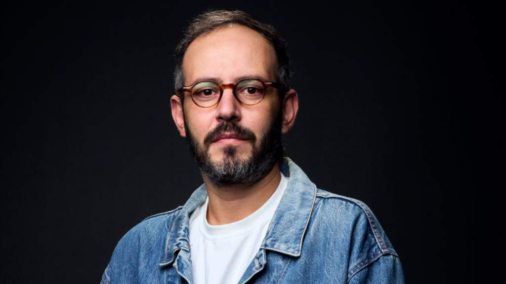 Bruno Oppido, nova contratação da Africa Creative, em um fundo preto